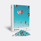 Hot air puzzle box with mound of pieces in front