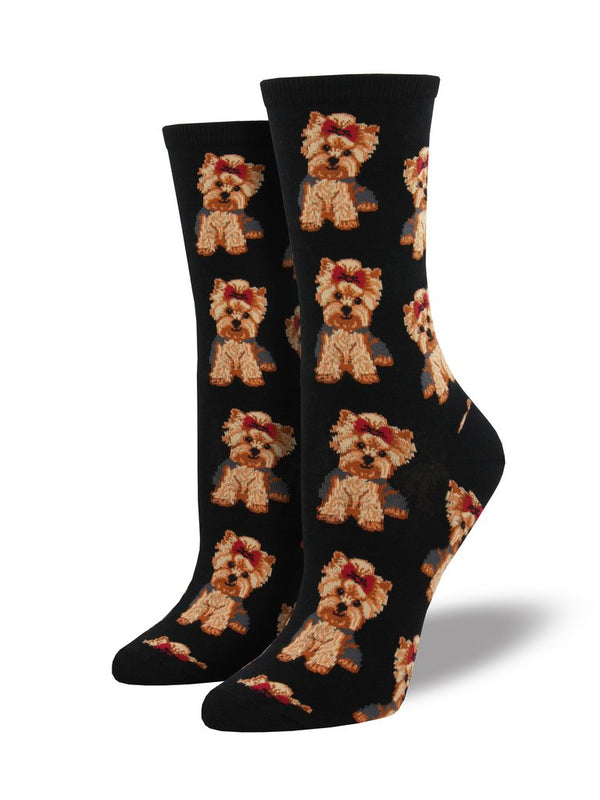 Black socks featuring Yorkies with red bows in their hair