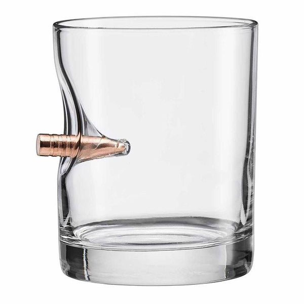 11 oz whiskey glass with bullet imbedded in the side