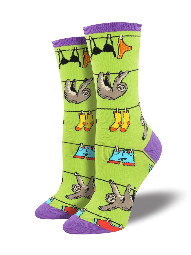 Green socks featuring sloths on a clothesline