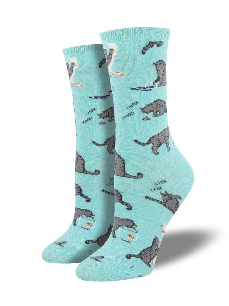 Blue socks featuring cats doing what cats do