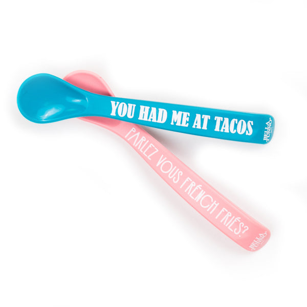Horizontal crossed orientation of Parlez vous french fries and you had me at tacos Spoons