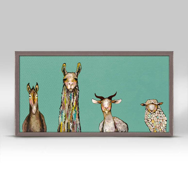 With a dark teal background a donkey, llama, goat and a sheep painted in various colors  and styles faces forward.