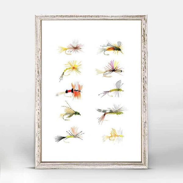 In two columns of five, colorful fly fishing lures are displayed.