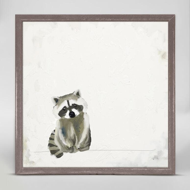 A print in gray, black and white of a baby raccoon sitting alone.