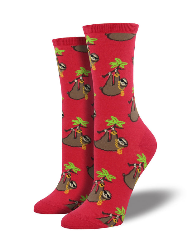 Red socks featuring blinged out sloths hanging from a tree