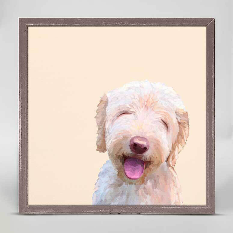 A short haired white dog with its pink tongue showing has closed eyes and a smiling face in a pastel orange background print.