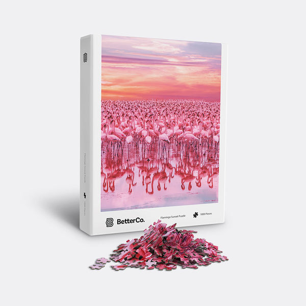 Flamingo sunset puzzle box with mound of pieces in front