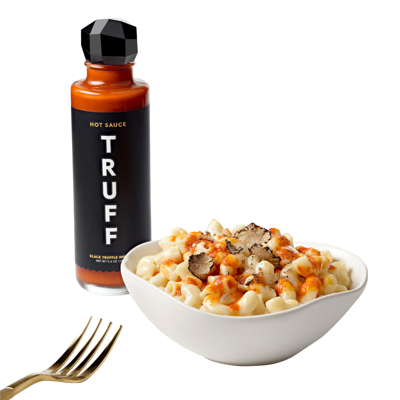 Truff Hot Sauce bottle with macaroni and cheese