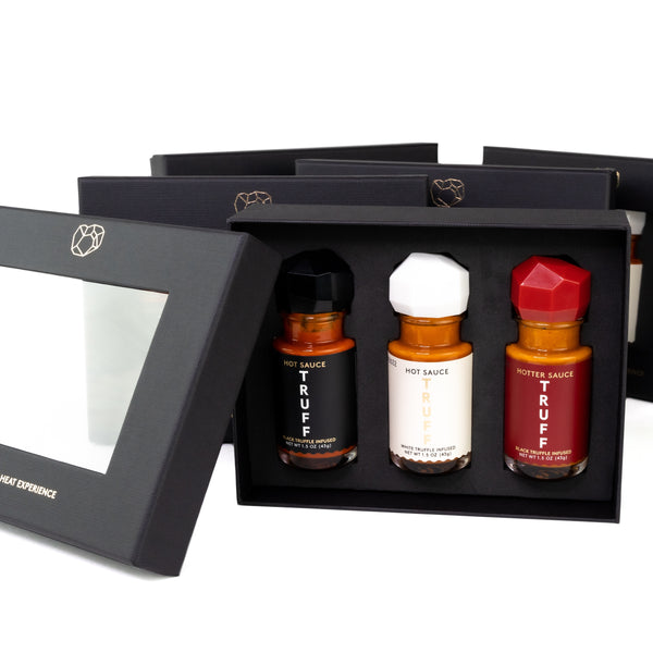 Truff Hot Sauce variety pack showing three bottles in retail box with cover on side