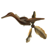 Closeup of Crane Whirly Mobile showing hand carved flying crane with duck feather tail.
