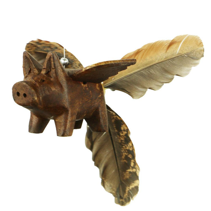 Closeup of Pig Whirly Mobile showing hand carved flying pig with duck feather tail.